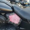 A close up of the seat on a motorcycle