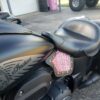 A close up of the seat on a motorcycle