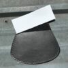 Black leather motorcycle fender patch.