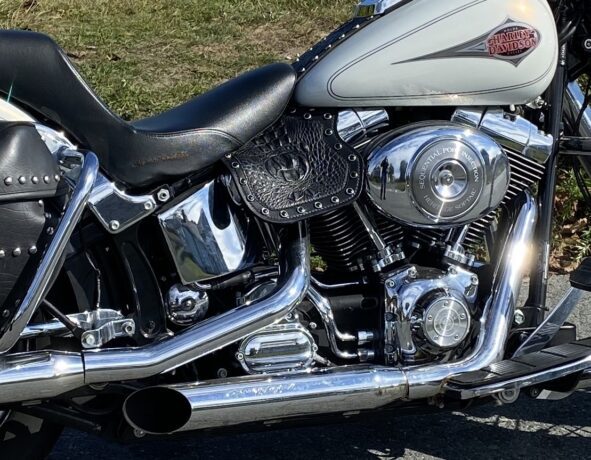 A close up of the chrome on the motorcycle.