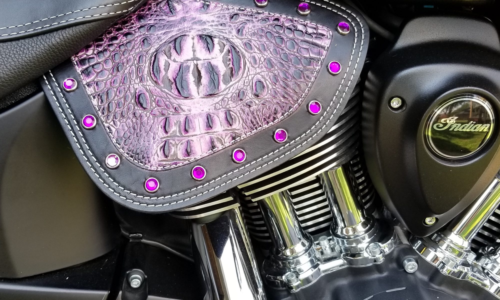 A close up of the engine cover on a motorcycle