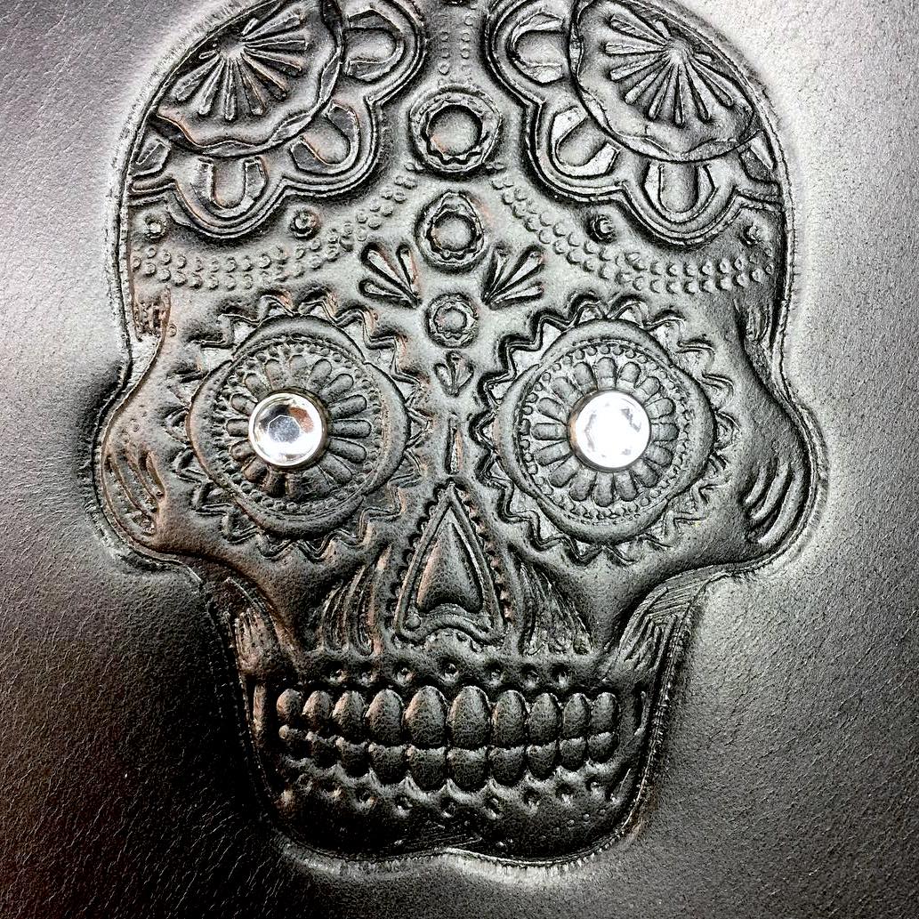 sugar skull embossed heat shield with crystals