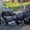A motorcycle parked on the side of a road.
