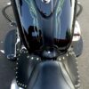 A close up of the back end of a motorcycle.