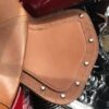 A close up of the leather on a motorcycle