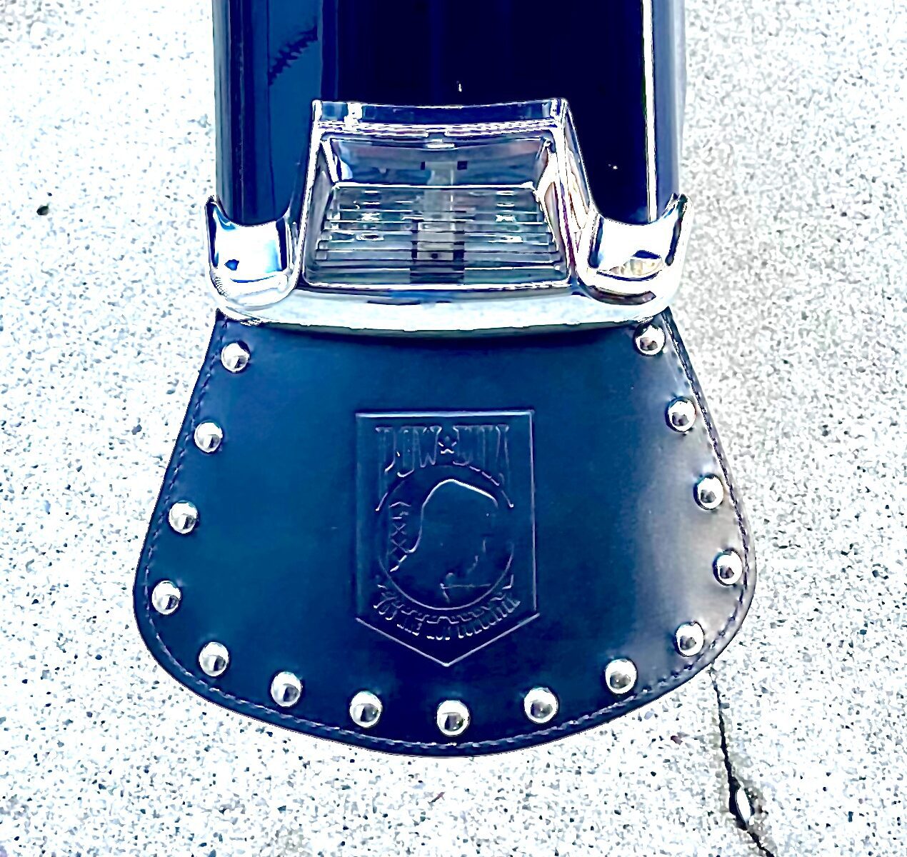 A close up of the top part of a motorcycle.