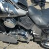 A motorcycle parked on the side of a road.