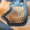 A close up of the leather on a bag