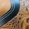 A close up of the leather on a purse