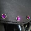 A close up of the purple stones on the handle bar.