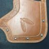A close up of the leather with a design on it