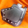 A black leather wallet with silver studs on it.