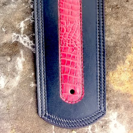 Indian fender bib with red alligator embossed leather overlay