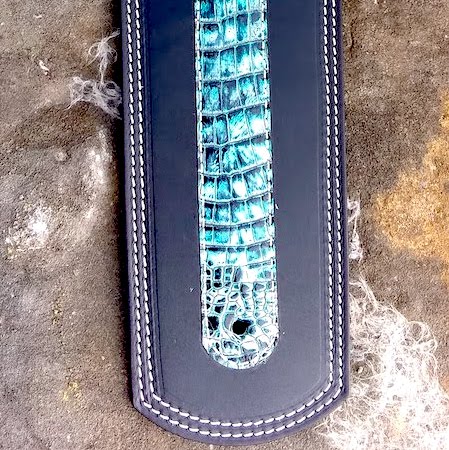 Indian fender bib with turquoise alligator embossed leather overlay