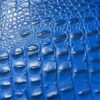 A close up of the blue leather surface