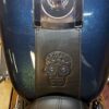A close up of the seat and back cover on a motorcycle.
