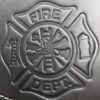 A close up of the fire department logo on a wallet.