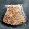 A close up of the back of a purse
