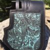 A close up of the front of a saddle bag