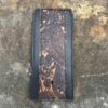 A wallet that is laying on the ground.