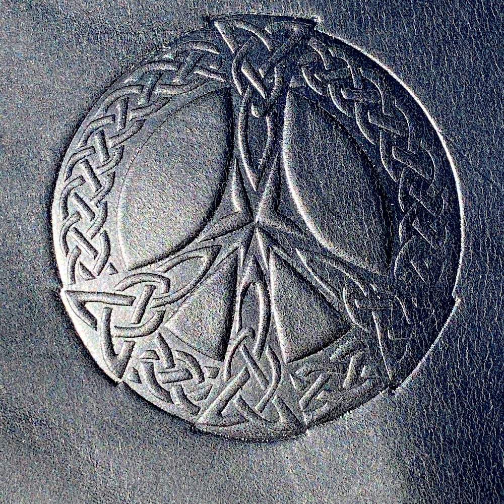 Celtic Peace Sign embossing on Harley-Davidson leather heat shield