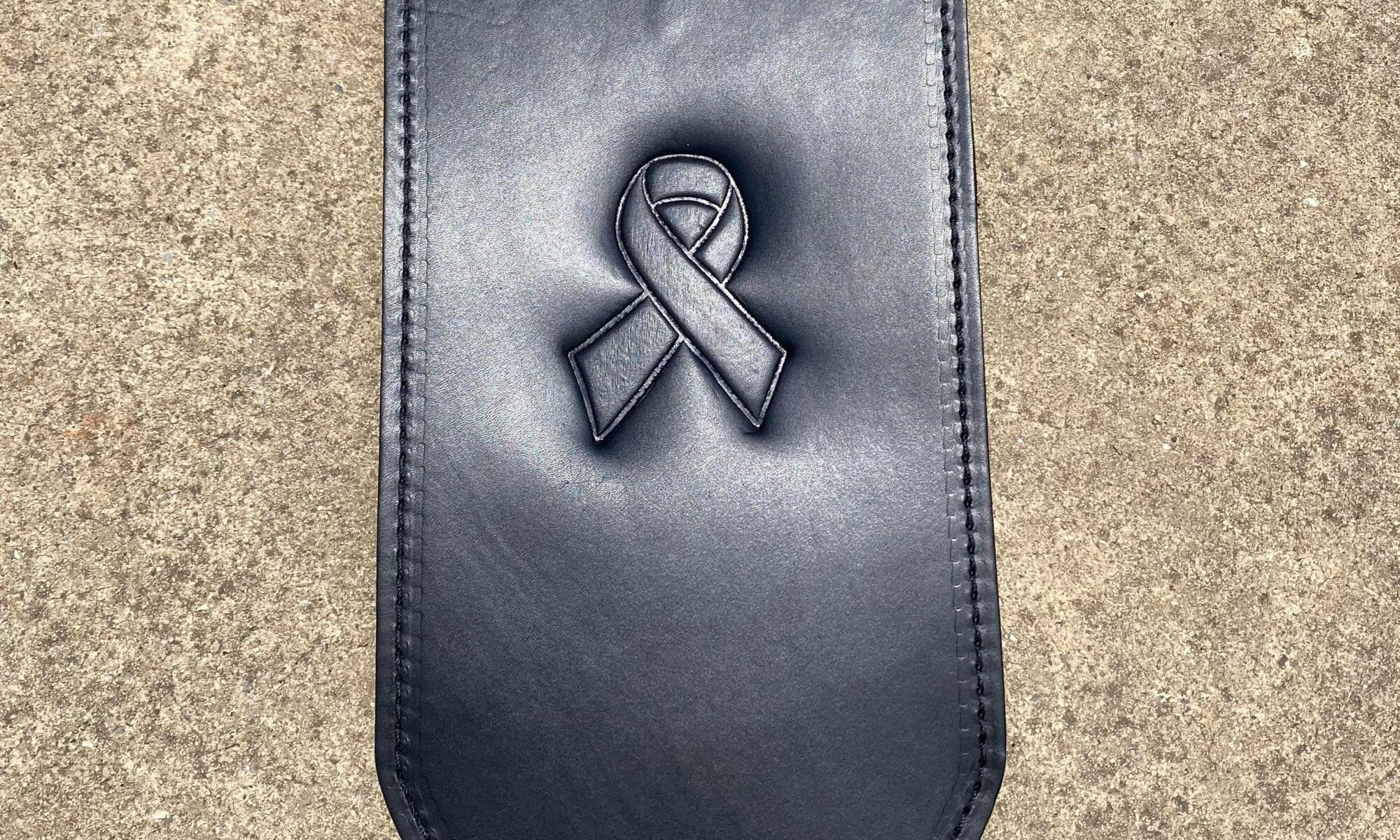 Harley fender bib with cancer ribbon by Captain Itch
