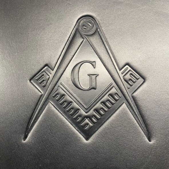 Harley heat shield with Masonic Lodge emblem embossing from Captain Itch