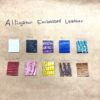 Alligator embossed leather samples on a wall