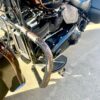A motorcycle parked on the side of a road.