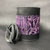 A purple and black leather wrapped container with some black string