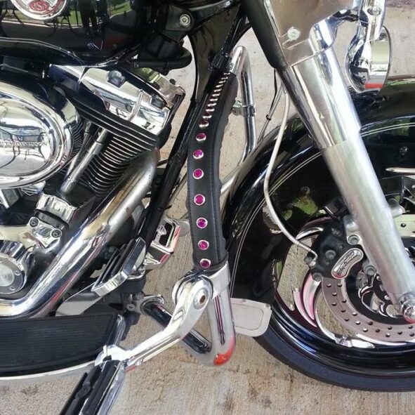 Motorcycle crash bar wrapped with pink crystals