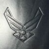 A close up of the air force logo on a metal object.