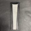 A black and white leather bookmark with the words " love " written on it.