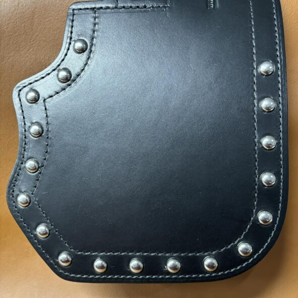 A black leather case with silver rivets on it.