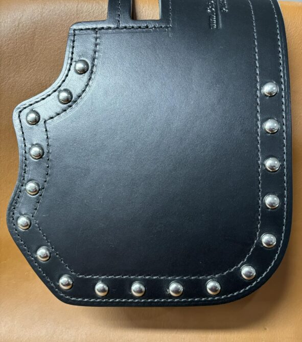 A black leather case with silver rivets on it.