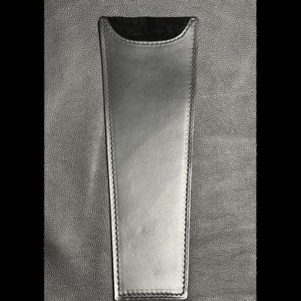 A silver case with a black top