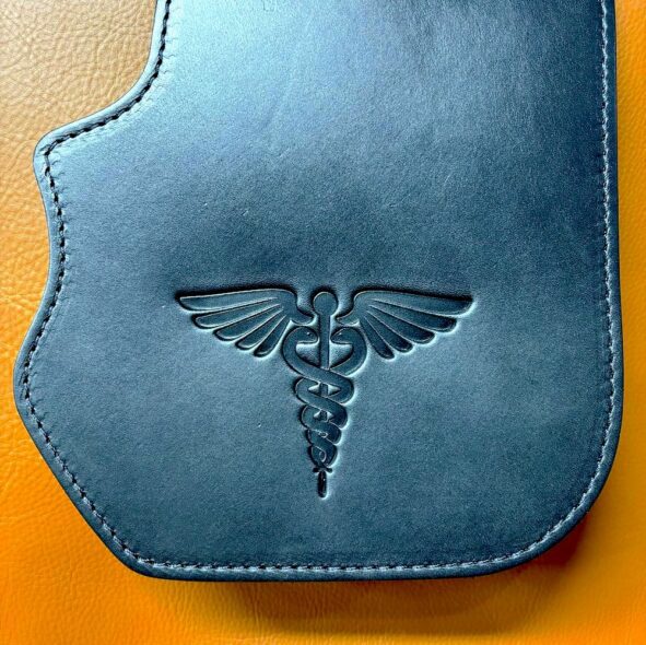 Harley Heat shield with Caduceus symbol of medicine embossing