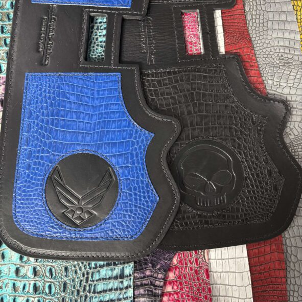 Harley heat shield with overlay and embossing